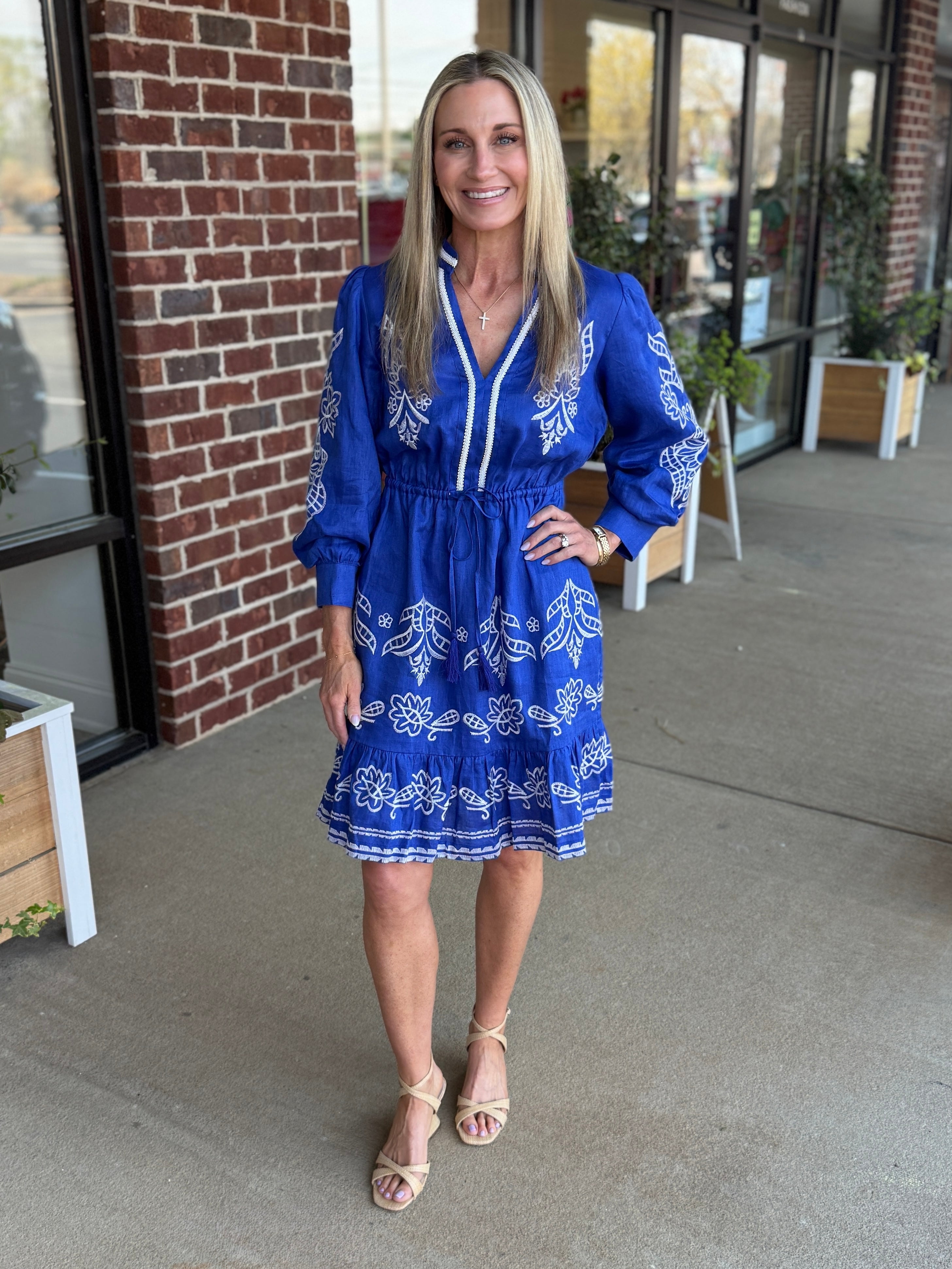 tyler boe dresses The Dress You Need in Your Closet Pop of Pippi This lively dress boasts a playful floral print in vibrant shades of purple and pink Tyler Boe Tulip